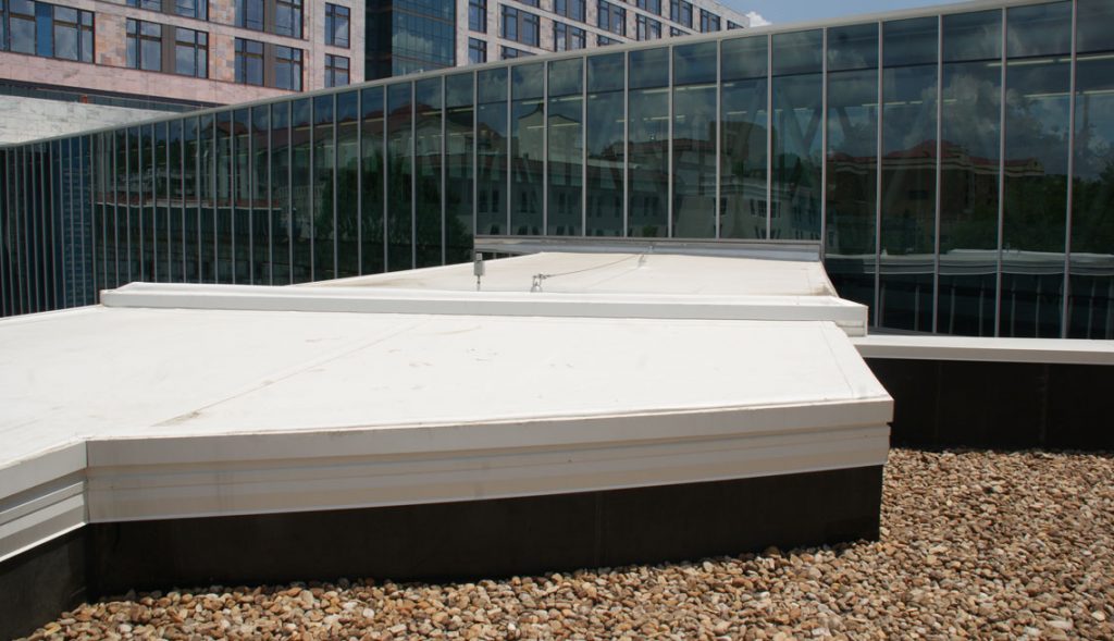 Custom expansion joints connect roof slopes